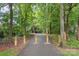 Scenic walking path winding through a wooded area, perfect for exercise and nature walks at 8219 Beardsley Dr, Charlotte, NC 28269