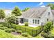 Landscaped backyard and screened-in porch at 867 Pecan Tree Ln, Fort Mill, SC 29715