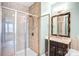 This bathroom features a tiled shower and a single vanity with marble countertop at 867 Pecan Tree Ln, Fort Mill, SC 29715