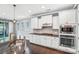Modern kitchen features stainless steel appliances, white cabinets, and a dark countertop at 867 Pecan Tree Ln, Fort Mill, SC 29715