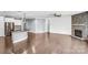 Open floor plan showcasing the living room with stone fireplace and shiplap wall that opens to the kitchen at 867 Pecan Tree Ln, Fort Mill, SC 29715