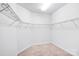 This walk-in closet includes carpeted floors, white walls, and wire shelving at 867 Pecan Tree Ln, Fort Mill, SC 29715