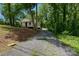 Charming house nestled in trees with a long gravel driveway at 905 Gantt St, Kings Mountain, NC 28086