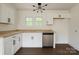 Bright kitchen featuring white cabinets, stainless steel appliances, and butcher block countertops at 905 Gantt St, Kings Mountain, NC 28086