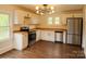 Bright kitchen featuring modern stainless steel appliances, wooden countertops, and ample storage space at 905 Gantt St, Kings Mountain, NC 28086