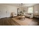 Comfortable living room with neutral decor, wood floors, and a large window at 905 Gantt St, Kings Mountain, NC 28086