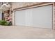 Spacious two-car garage with a clean, modern aesthetic and ample room for parking and storage at 9112 Butterfly Ct, Gastonia, NC 28056