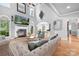 Comfortable living room with fireplace, stylish furnishings, and hardwood floors, designed for relaxation and comfort at 9112 Butterfly Ct, Gastonia, NC 28056