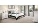 Cozy bedroom featuring a comfortable bed, bedside tables, lamps, and a serene atmosphere at 10116 Florentine Way, Charlotte, NC 28214