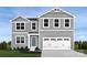 Charming two-story home with gray siding, a two-car garage, and a well-manicured lawn at 10116 Florentine Way, Charlotte, NC 28214