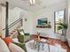 Inviting living room with hardwood floors, a ceiling fan and comfortable seating at 956 Warren Burgess Ln, Charlotte, NC 28205