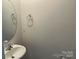 Powder room with a pedestal sink at 9730 Tea Garden Dr, Gastonia, NC 28056