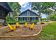 Backyard patio with chairs, ideal for outdoor entertaining and relaxation at 9929 Kerns Rd, Huntersville, NC 28078