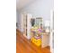 Hallway featuring hardwood floors, stylish furniture, and decor at 9929 Kerns Rd, Huntersville, NC 28078