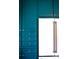 Modern kitchen with stainless steel appliances and teal cabinets at 9929 Kerns Rd, Huntersville, NC 28078