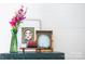 Bright living room details include artwork, flower bouquet, and a scented candle at 9929 Kerns Rd, Huntersville, NC 28078