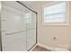 Modern bathroom with sleek glass shower and natural light creates a spa-like experience at 1028 Gibson St, Albemarle, NC 28001