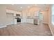 Bright kitchen features stainless steel appliances, granite countertops, and ample cabinet space at 1028 Gibson St, Albemarle, NC 28001
