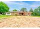 Back of house with brick facade and back patio at 105 Hopewell Church Rd, Shelby, NC 28152
