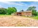 Back of house with brick facade and back patio at 105 Hopewell Church Rd, Shelby, NC 28152