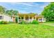 Charming home featuring a covered front porch and lush green lawn at 105 Hopewell Church Rd, Shelby, NC 28152