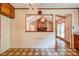 Spacious kitchen with unique tile flooring and a view to the fireplace at 105 Hopewell Church Rd, Shelby, NC 28152