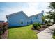 Landscaped backyard exterior featuring lush green lawn and colorful flower beds at 1100 Herrons Ferry Rd, Rock Hill, SC 29730