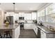 Modern kitchen featuring stainless steel appliances, gray countertops, white cabinetry and subway tile backsplash at 1100 Herrons Ferry Rd, Rock Hill, SC 29730
