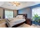 Serene main bedroom with a tray ceiling and comfortable layout at 1209 Danielle Downs Se Ct, Concord, NC 28025