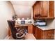 Efficient home office setup with built-in cabinetry and granite countertops at 128 Aztec Cir, Mooresville, NC 28117