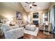 Cozy living room with vaulted ceilings, fireplace, and comfortable seating at 128 Aztec Cir, Mooresville, NC 28117