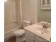 A full bathroom with single vanity, mirror and shower over tub combination at 13039 Peacock Ln, Charlotte, NC 28215