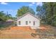 Exterior view of the back of the home with a patio and yard at 1407 7Th St # 4, Statesville, NC 28677