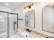 Bathroom with tile shower, granite vanity, and bronze fixtures at 1407 7Th St # 4, Statesville, NC 28677