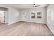 Bright living room featuring lots of natural light, hardwood floors, and an elegant door at 1407 7Th St # 4, Statesville, NC 28677