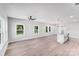 Bright, open-concept living and kitchen area featuring hardwood floors and modern fixtures at 1407 7Th St # 4, Statesville, NC 28677