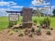 The Winecoff Village community entrance features a brick pillar, landscaped greenery, and inviting signage at 146 Astor St, Troutman, NC 28166