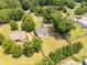 This aerial shows a great backyard with a covered patio and outdoor living space at 1530 Danlee Dr, Lancaster, SC 29720