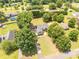 An aerial view captures the home's placement among lush trees and landscaped yards at 1530 Danlee Dr, Lancaster, SC 29720