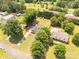 The aerial view of this home displays its landscaped yard with lots of mature trees at 1530 Danlee Dr, Lancaster, SC 29720