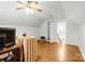 Spacious bonus room with hardwood floors, a ceiling fan, and a doorway to another room at 1530 Danlee Dr, Lancaster, SC 29720