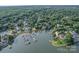 Aerial view of homes near the lake with a marina at 15708 Eagleview Dr, Charlotte, NC 28278