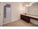Spacious bathroom showcasing vanity and large mirror with integrated lighting at 15708 Eagleview Dr, Charlotte, NC 28278