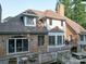 Exterior features a large deck overlooking the backyard at 15708 Eagleview Dr, Charlotte, NC 28278