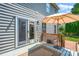 Wooden deck overlooking the backyard, providing a private outdoor space for relaxation and entertainment at 167 Foxtail Dr, Mooresville, NC 28117