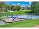 Community playground and tennis court offer recreational activities for families and residents at 167 Foxtail Dr, Mooresville, NC 28117