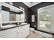 Bathroom features double vanity with granite countertops and modern fixtures at 1701 Truman Rd, Charlotte, NC 28205