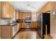 Kitchen with stainless steel appliances, granite countertops, and hardwood floors at 1701 Truman Rd, Charlotte, NC 28205