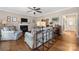 Spacious living room featuring hardwood floors, a fireplace, and comfortable seating at 1701 Truman Rd, Charlotte, NC 28205