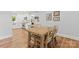 Dining room with wood flooring, neutral walls and natural light at 18733 Bluff Point Rd, Cornelius, NC 28031